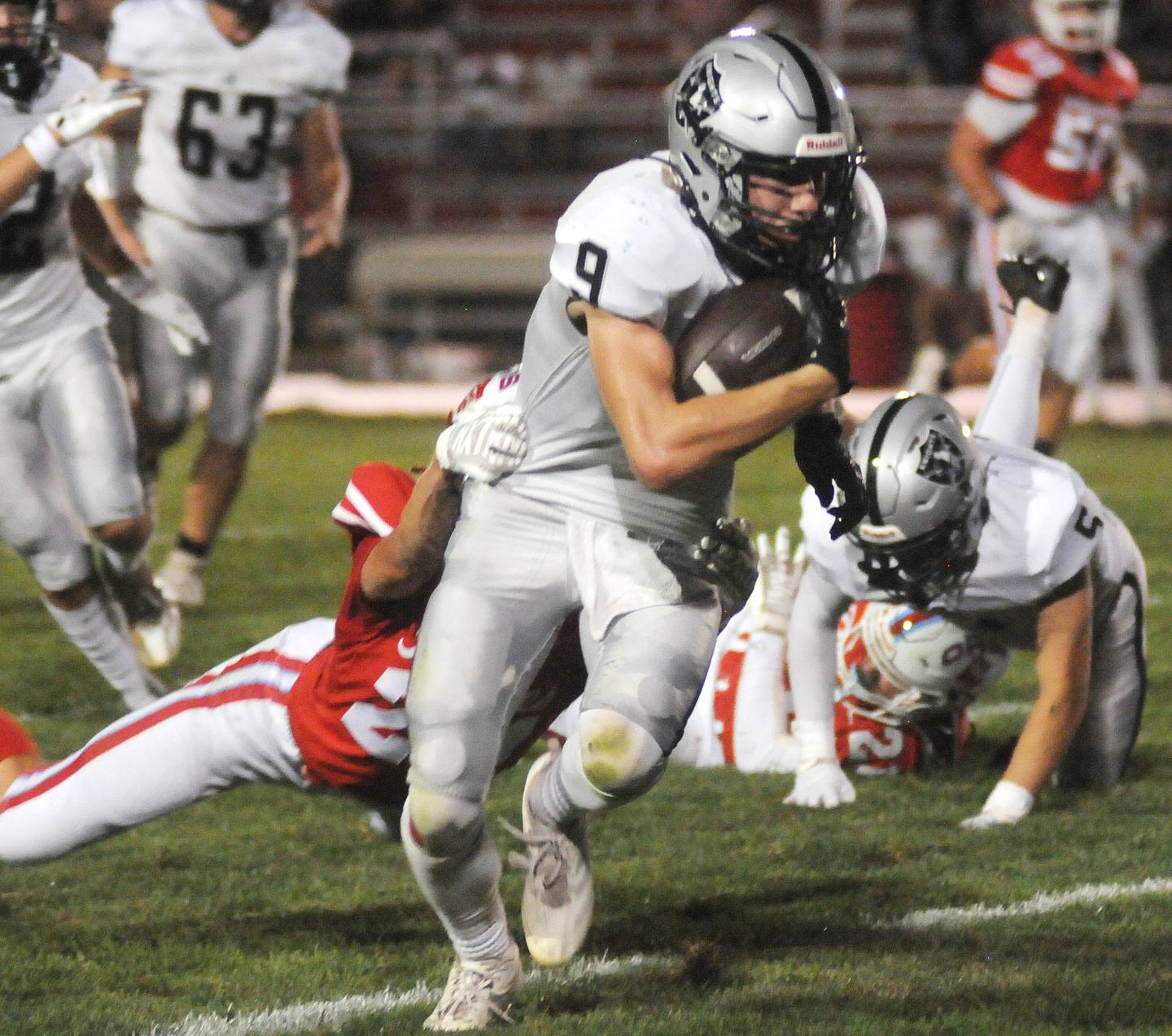 Ottawa's Weston Averkamp tackles Kaneland's Carter Grabowski at King Field on Friday, Sept. 20, 2024.