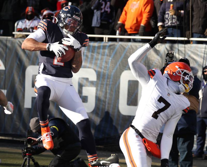 Chicago Bears wide receiver DJ Moore catches a touchdown behind Cleveland Browns cornerback Tyson Campbell during their game Sunday, Dec. 14, 2025, at Soldier Field in Chicago.