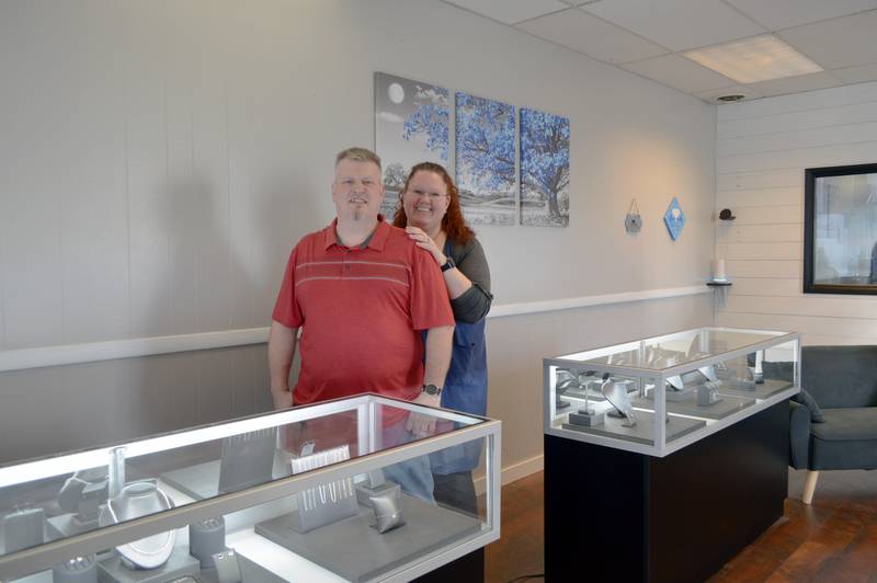 Jen Brooks (right) and Nick Brooks pose for a photo on Saturday, Nov. 2, 2024, inside Brooks Jewelers. Jen Brooks is the primary owner and Nick Brooks the co-owner of the Oregon-based store.