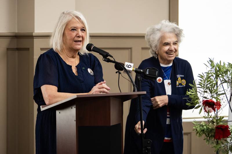 Ladies Auxiliary members Sue Bustin and Rosemary Mulligan address the crowd during a Veterans Day ceremony at American Legion Post 1080 in Joliet on Nov. 11, 2025.