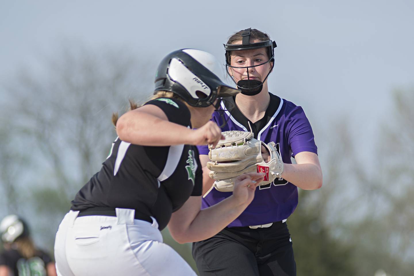 Dixon's Ellie Jarrett tags out Rock Falls' Abby Whiles Tuesday, May 10, 2022 in Rock Falls.