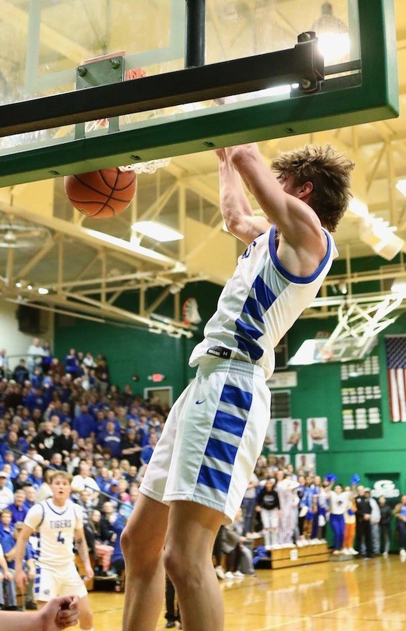 Princeton senior Teegan Davis throws down a dunk to give the Tigers a 11-10 lead at the end of the third quarter in Friday's Class 2A Orion Sectional at Geneseo.