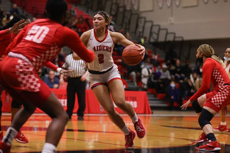 Bolingbrook’s Tatiana Thomas makes a move to the basket  against Homewood-Flossmoor in the Class 4A Bolingbrook Sectional championship. Thursday, Feb. 24, 2022, in Bolingbrook.