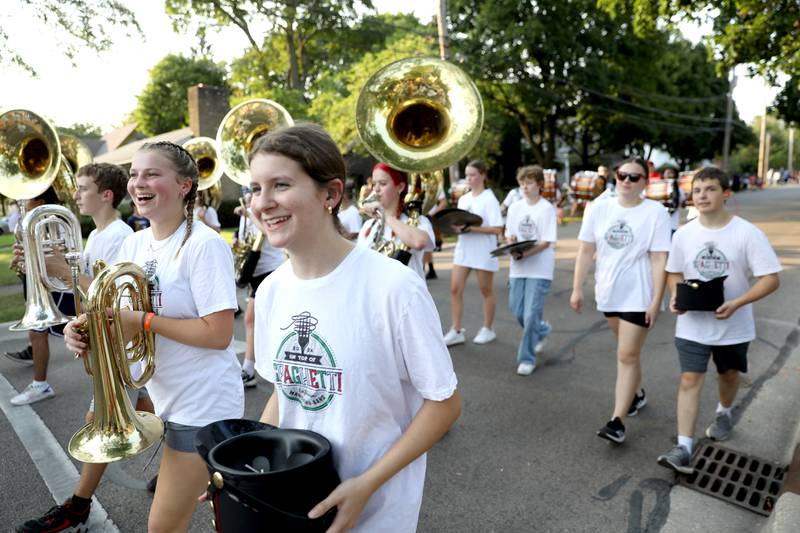 The Batavia High School marching band walks south on Lincoln Street during the school’s annual homecoming parade on Wednesday, Sept. 11, 2024 in Batavia.