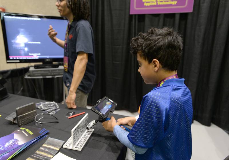 Children including Abel Gebre of Villa Park learn how to weld during the STEMCON event on Saturday April 26, 2025 at the College of DuPage in Glen Ellyn.