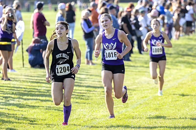 Rock Fall’s Hana Ford leads Dixon’s Teyla Wendt and Olivia Arduini down the stretch at the Rock River Run Saturday, Sept. 23, 2023 at Hoover Park in Sterling.