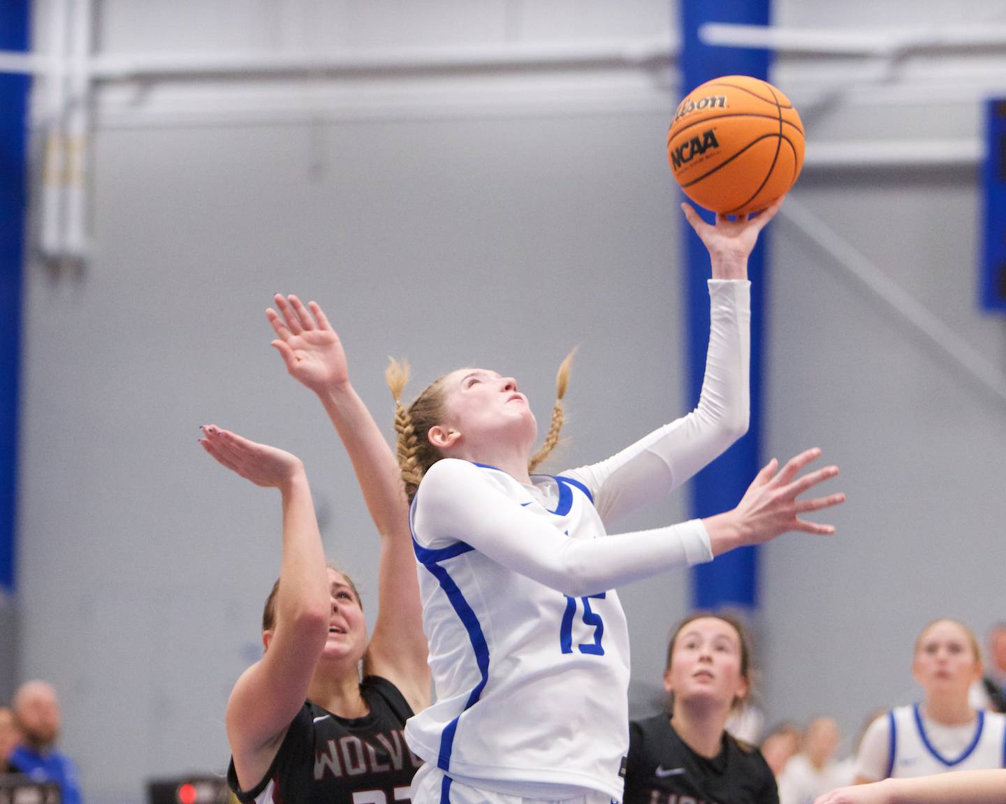 St. Charles North's Bronwyn How goes in for the shot against Prairie Ridge at the Burlington Central Tournament on Tuesday, Nov. 19,2024 in Burlington.