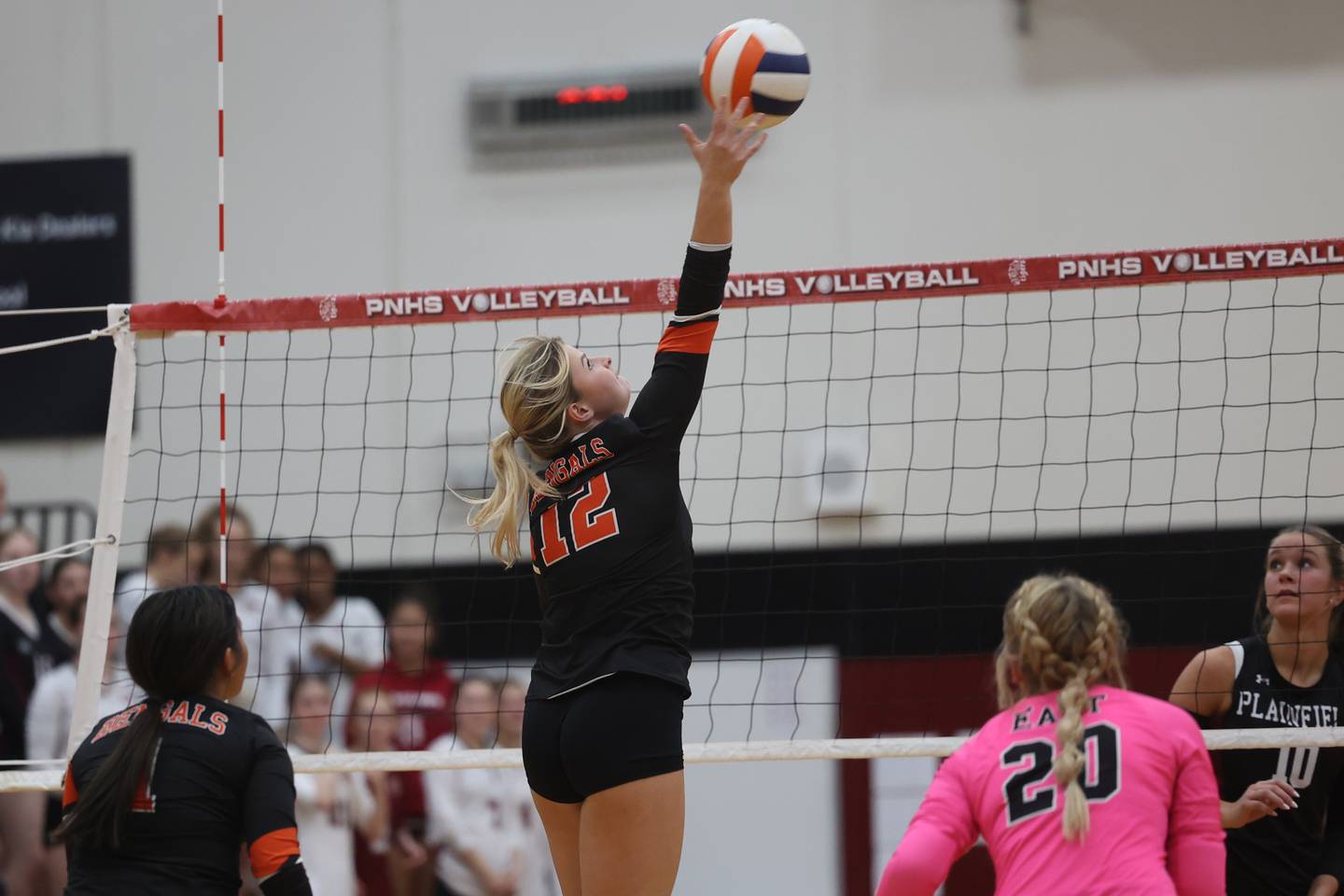 Plainfield East’s Faith Fitzgerald hits a shot against Plainfield North on Tuesday, Oct. 10, 2023 in Plainfield.