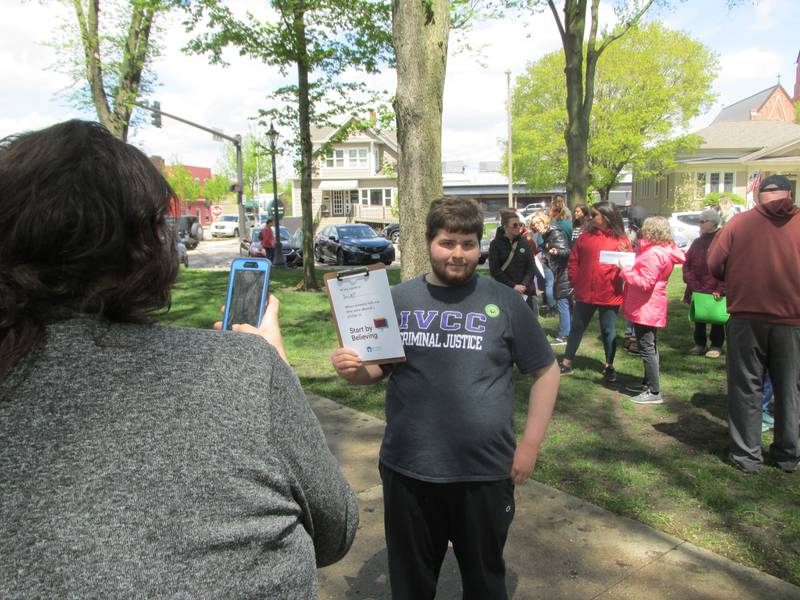 About 50 people attended the March to Believe organized by Safe Journeys on Saturday, April 29, 2023, at Washington Square in Ottawa. Several of the attendees took their photos pledging "when someone tells me they were abused, I pledge to start by believing."