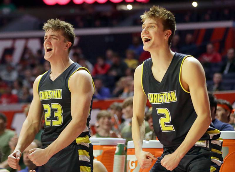 Yorkville Christian's Brayden Long (23) and Jaden Shutt (2) react after watching their teammates score a basket late in the fourth quarter against Steeleville in the Class 1A State semifinal game on Thursday, March 10, 2022 at the State Farm Center in Champaign. Yorkville Christian will play Liberty in the Class 1A State championship game on Saturday at 11a.m.