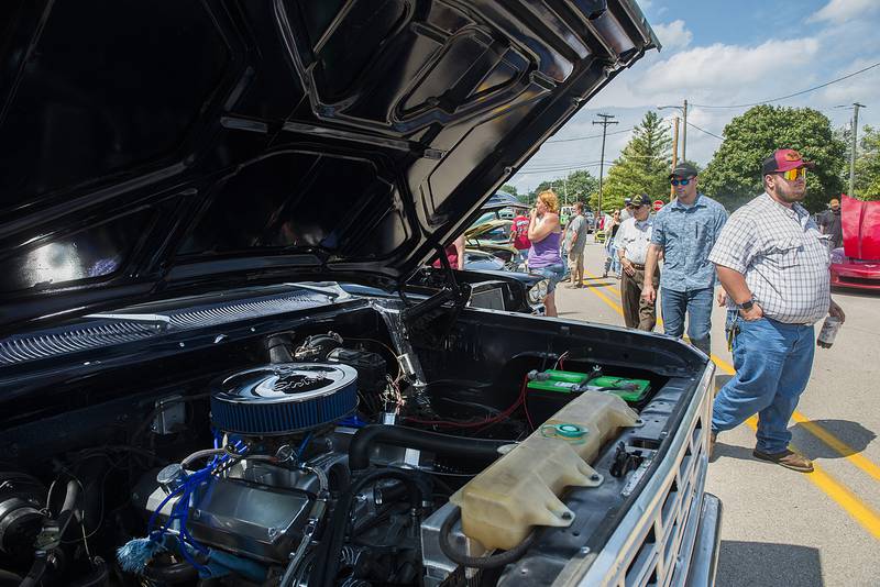 Car enthusiasts check out the rides Sunday, Aug. 28, 2022 during Amboy Depot Days’ car show. The four-day event was capped off with the drawing of the big 50/50 raffle.