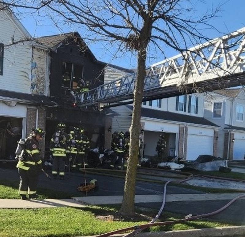 Firefighters respond to a fire that damaged a residence on Sunday, Nov. 19, in the 1100 block of Heron Circle in Joliet.