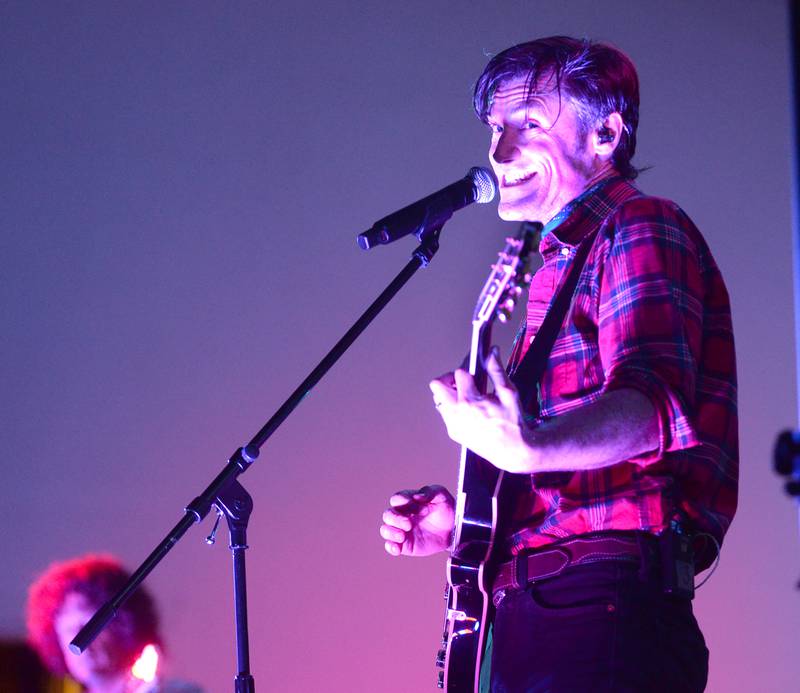 A member of Fortunate Sons, a Creedence Clearwater tribute band, teases the crowd about the band's next selection during the Jamboree Concert Series in Mt. Morris on Friday, Aug, 29, 2025.
