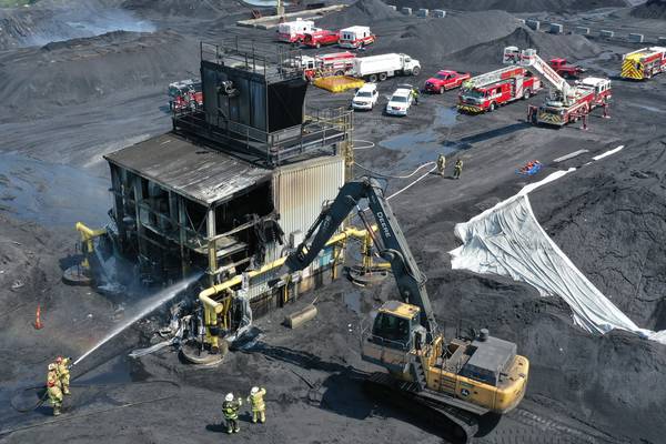 Photos: Three-alarm fire breaks out at Washington Mills near Hennepin