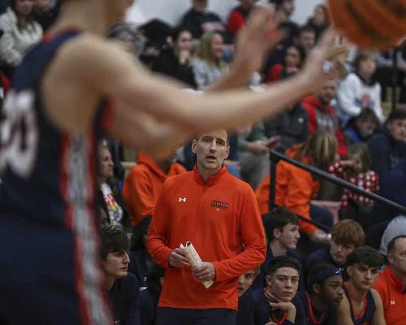 Oswego's head coach Nick Oraham looks on as the ball is in bounded during their basketball game between Oswego at Yorkville Friday, Dec 12, 2025 in Yorkville.
