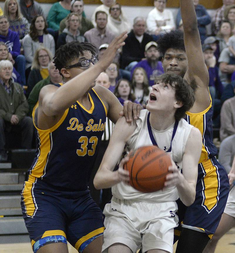Serena’s Hunter Staton eyes the basket trying to avoid the blocks by the St Francis De Sales defense in the 1st period during the Class 1A Sectional final on Friday, March 3, 2023 at Putnam County High School.