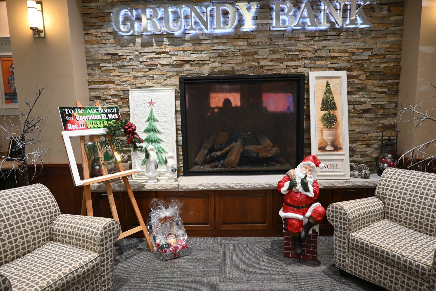 Operation St. Nick Radio Auction items on display at Grundy Bank in Morris.