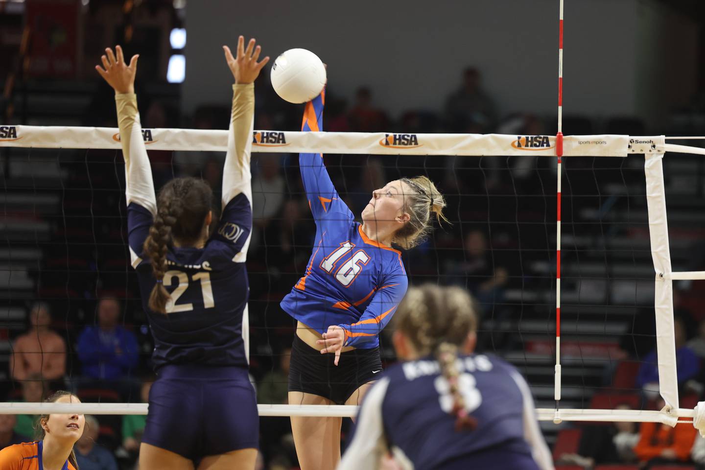 Genoa-Kingston’s Alayna Pierce sends an attack to the IC Catholic isiide of the net during the Class 2A championship match Saturday, No. 12, 2022, in Normal.