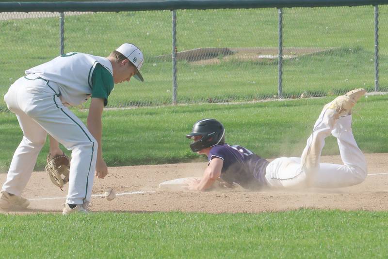 St. Bede's Carson Riva drops the ball at third base as Serena's Tucker Witeaker slides safely into the bag on Friday, April 24, 2026 at St. Bede Academy.