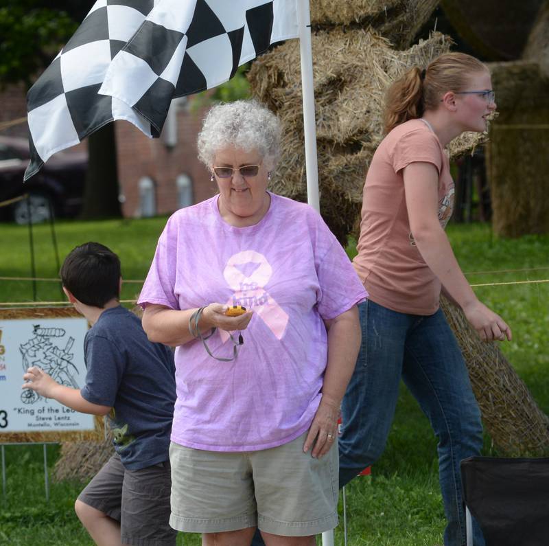 Brenda Higley of Mt. Morris was the official timer at the Straw Bale Race during Strawfest on Saturday, Aug. 23, 2025 on the Campus square in downtown Mt. Morris.