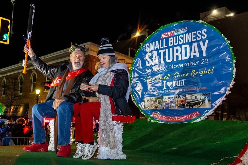 Joliet Slammers Co-Owner Mike Veeck serves as grand marshal of the Light Up the Holidays Parade, as it moves down Chicago Street in Joliet on Nov. 28, 2025.