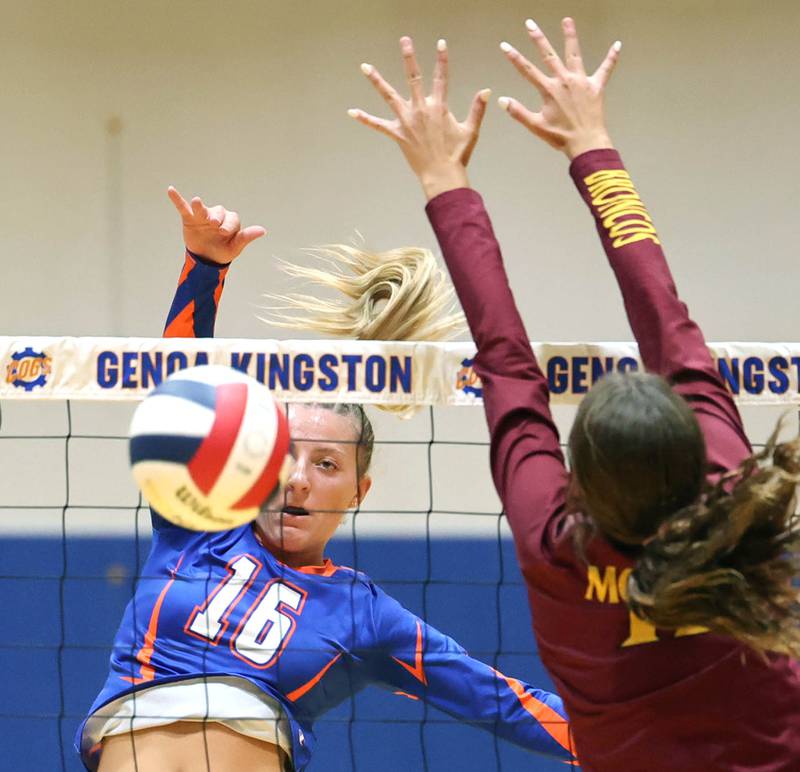 Genoa-Kingston's Alayna Pierce spikes the ball by a Montini blocker during their match Tuesday, Sep. 5, 2023, at Genoa-Kingston High School.