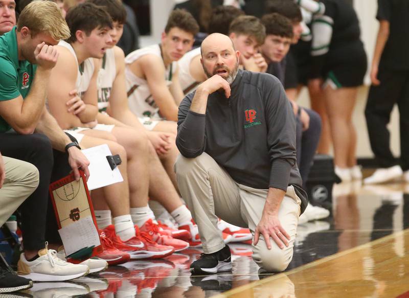 L-P head basketball coach John Senica watches his team play Fieldcrest during the 49th annual Colmone Classic on Friday, Dec. 8, 2023 at Hall High School.
