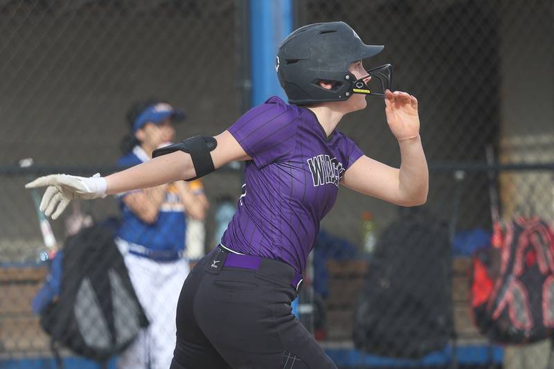 Wilmington’s Molly Southall connects for a 2-run inside the park home run against Joliet Central on Tuesday, March 12 in Joliet.