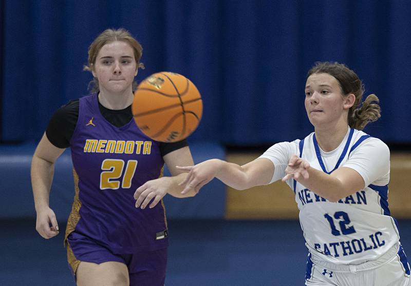 Newman’s Lucy Oetting makes a pass against Mendota Thursday, Dec. 4, 2025.