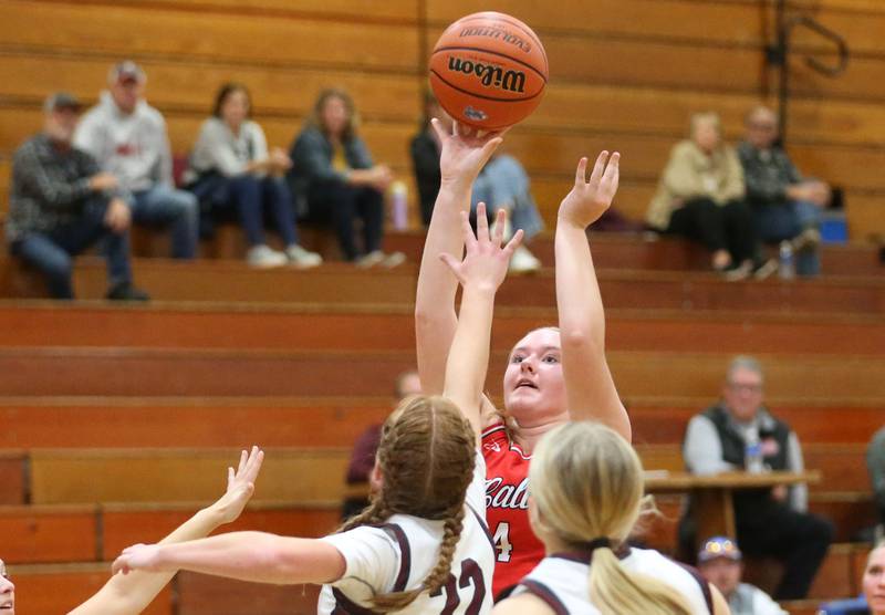 Hall's Ella Sterling shoots a jump shot over Illinois Valley Central's Brenna Phelps during the Princeton Holiday Girls Basketball Tournament on Tuesday, Nov. 19, 2024 at Princeton High School.