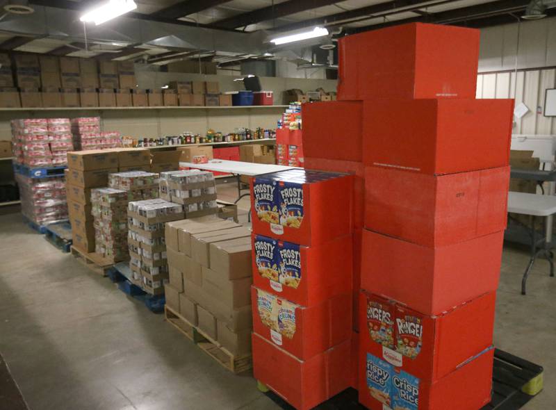 Pallets of cereal and can goods fill the floor on Tuesday, Oct. 28, 2025 at the Illinois Valley Food Pantry in Peru. Food assistance used by more than 40 million Americans will not be distributed from November due to the ongoing US government shutdown. Food shortage will worsen local food pantries due to the the shutdown.