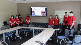 Nursing students from Lewis University in Romeoville help vaccinate people with special needs