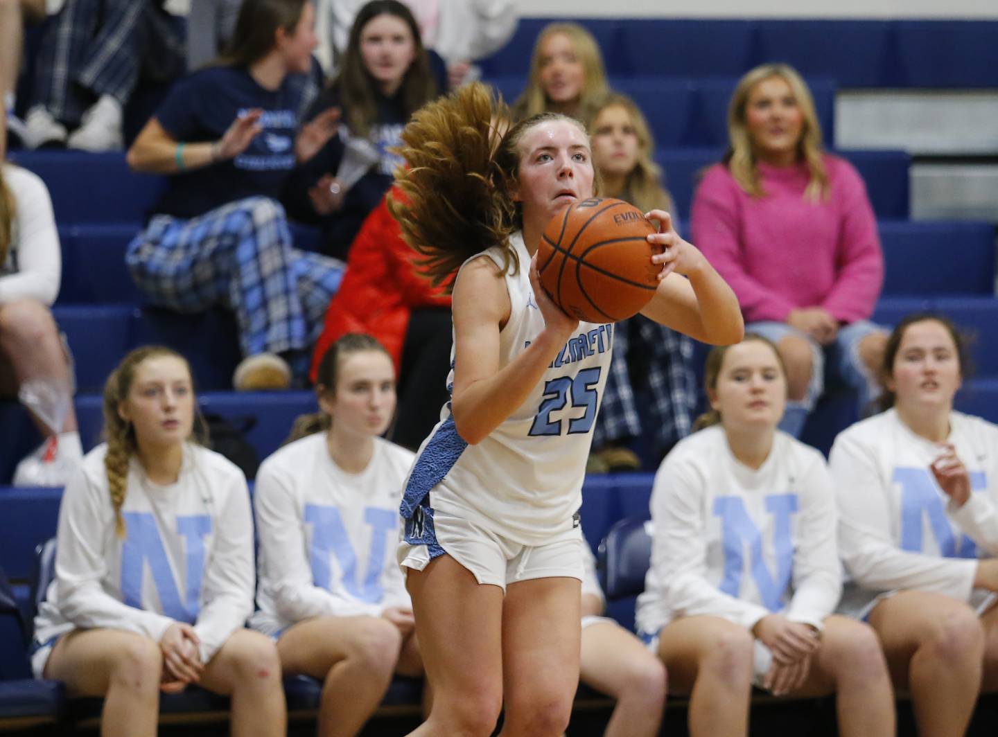 Nazareth's Amalia Dray (25) puts up a shot during the girls varsity basketball game between Carmel High School and Nazareth Academy on Wednesday, Dec. 7, 2022 in LaGrange, IL.