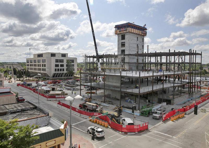 Construction crews work on the new Will County Courthouse on July 27 in Joliet.
