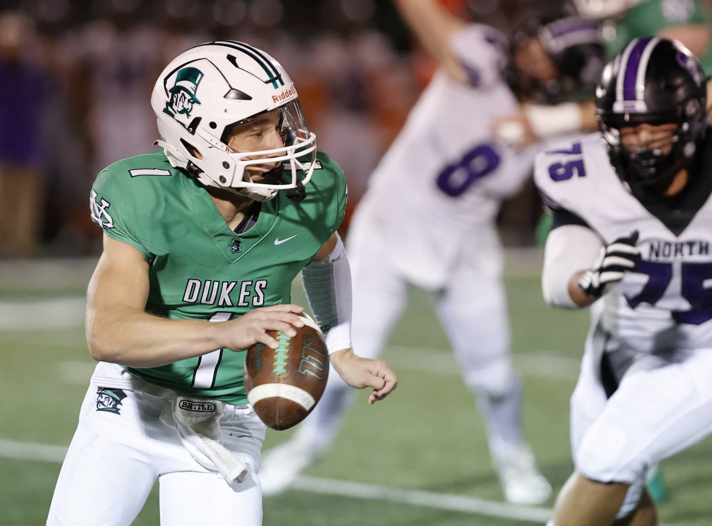 York's Bruno Massel (1) scrambles during the varsity football game between Downers Grove North and York on Friday, Oct. 4, 2024 in Elmhurst.
