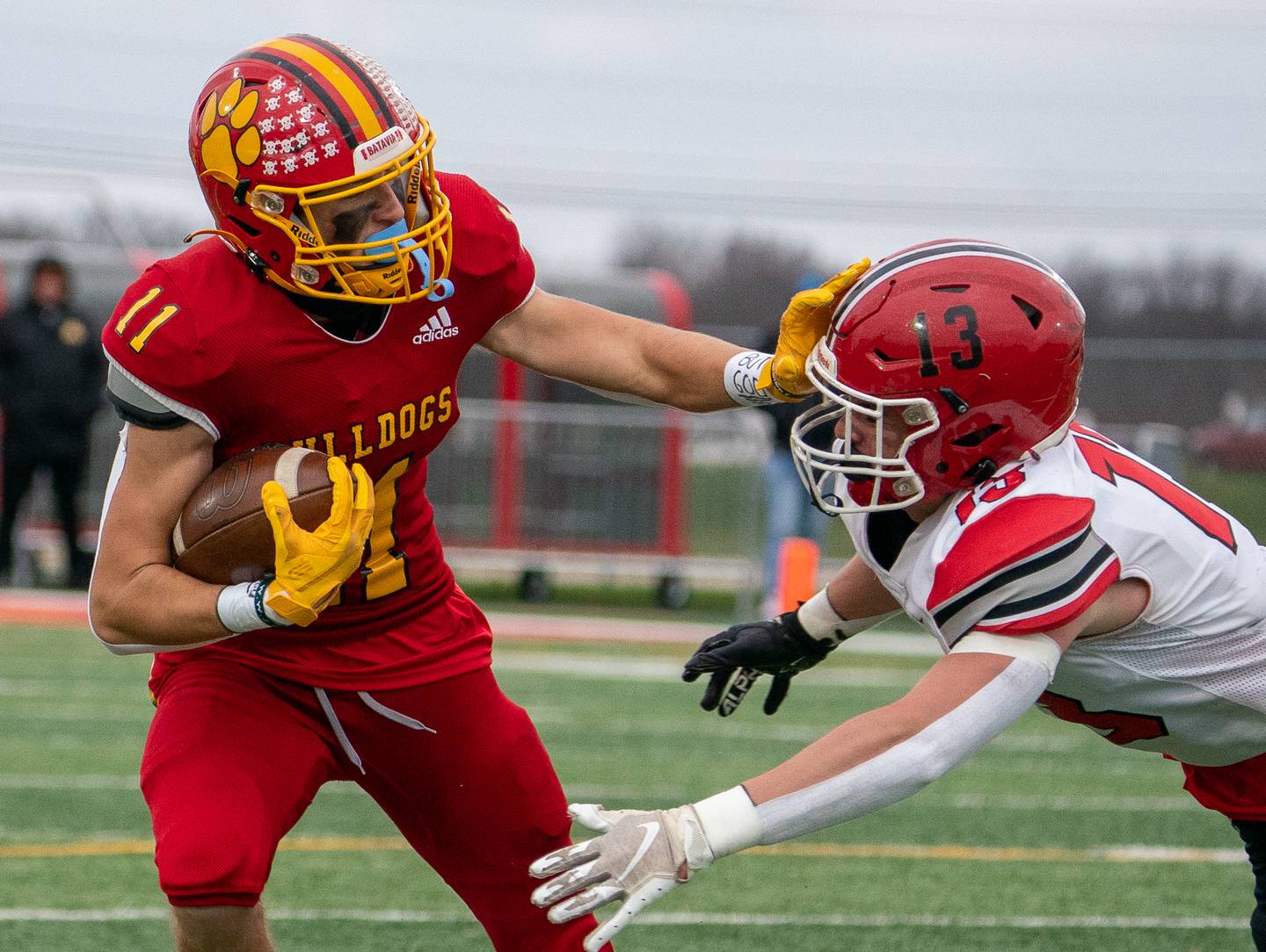 Batavia’s Gerke Drew (11) runs after the catch against Yorkville's Ben Alvarez (13) during a 7A quarterfinal playoff football game at Batavia High School on Saturday, Nov 12, 2022.