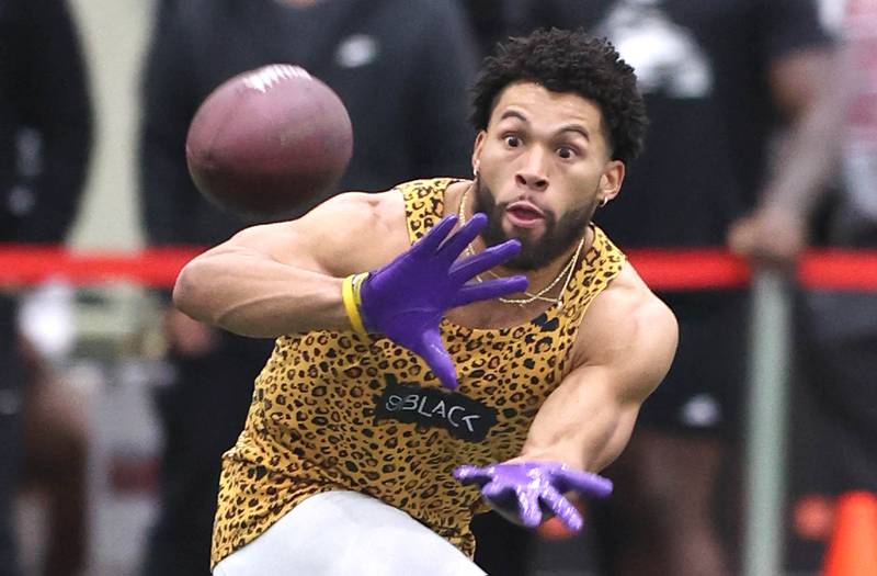 Former Western Illinois University and DeKalb High School receiver Tony Tate makes a catch Wednesday, March 30, 2022, during pro day in the Chessick Practice Center at NIU. Several NFL teams had scouts on hand to evaluate the players ahead of the upcoming draft.