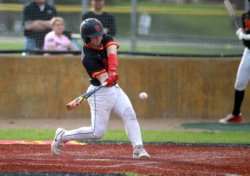 Batavia's Brandon Oke makes contact during a game against St. Charles North on Thursday, April 24, 2025 in Batavia.