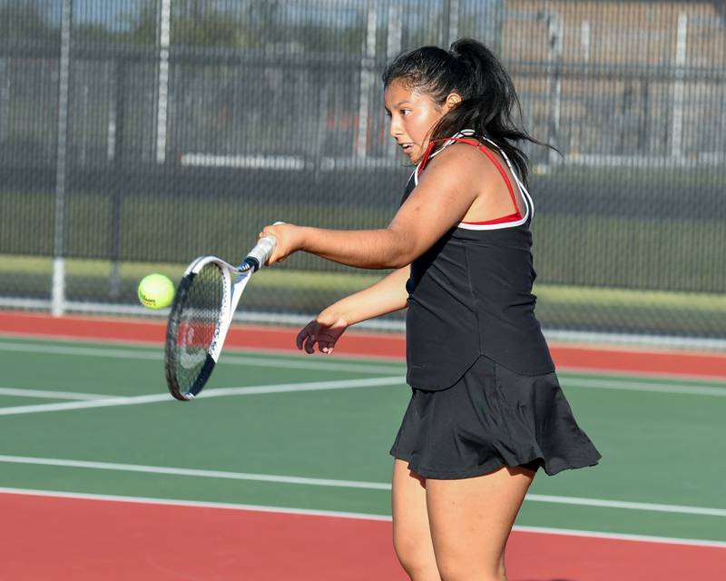 DeKalb's Heidy Martinez returns a volley in the second single match while taking on Sycamore in the second singles match on Thursday Sept. 25, 2025, held at DeKalb High School.