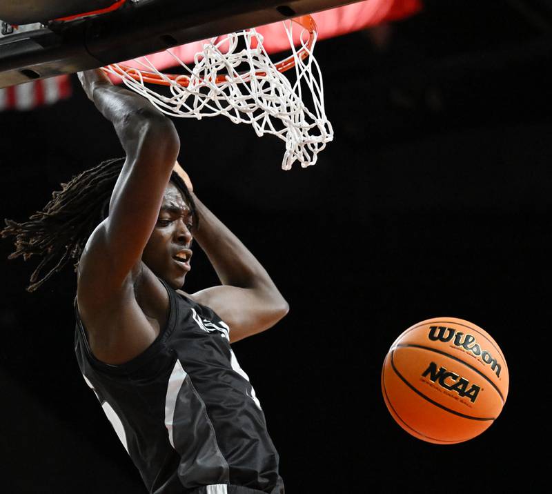 Kaneland's Freddy Hassan dunks during the Class 3A boys supersectional game against DePaul College Prep at NOW Arena on Monday, March 10, 2025 in Hoffman Estates.