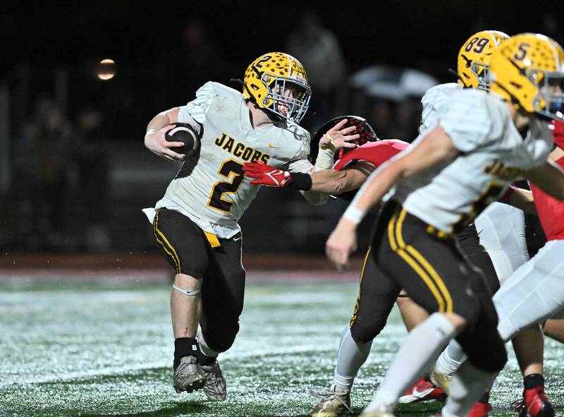 Jacob's Ryan Tucker runs the ball during the class 7A first round  playoff game against Lincoln-Way Central on Friday, Oct. 27, 2023, at New Lenox. (Dean Reid for Shaw Local News Network)