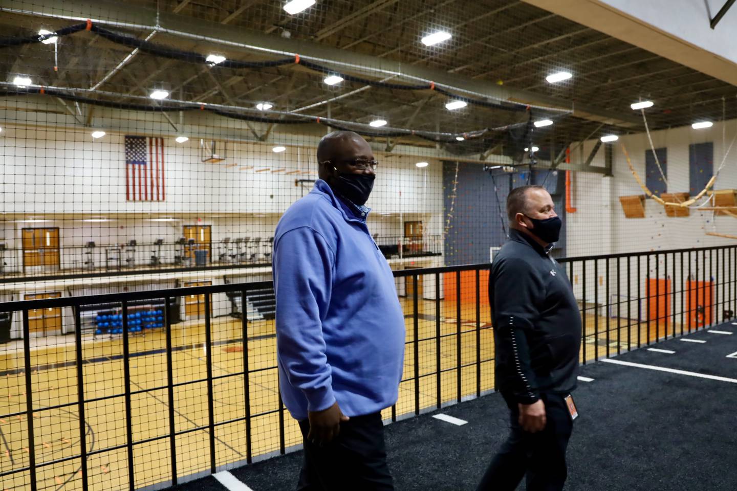 New McHenry athletic director Joel Beard (left) will take over for retiring AD Barry Burmeister this summer. Beard was hired by the District 156 school board Monday night.