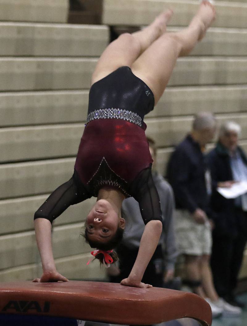 Prairie Ridge’s Maria Kakish competes in vault Wednesday, Feb. 8, 2023, during  the IHSA Stevenson Gymnastics Sectional at Stevenson High School in Lincolnshire.