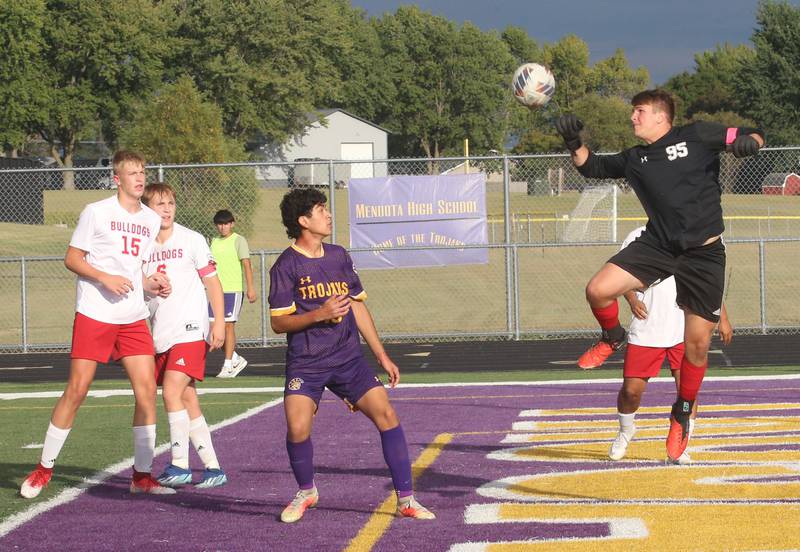 Streator keeper Andrew Vogel punches the balll out of the box against Mendota on Monday, Sept. 23, 2024 at Mendota High School.
