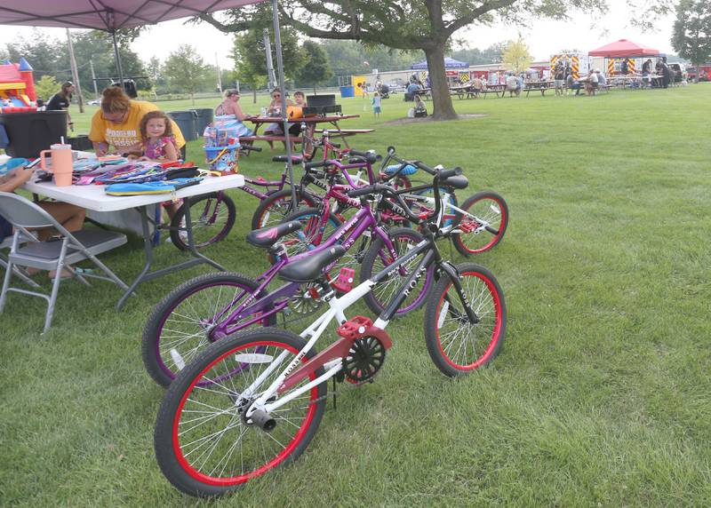 A view of some of the prize bikes for the National Night Out on Tuesday, Aug. 5, 2025 in Oglesby. glebsy Police, Fire and EMS along with Utica Fire, Illinois State Police and OSF Lifeflight helicopter also attended. The event featured food, foam machine, bounce house, games and more. National Night Out is an annual community policing campaign held on the first Tuesday of August to create police-community partnerships and build safer neighborhoods