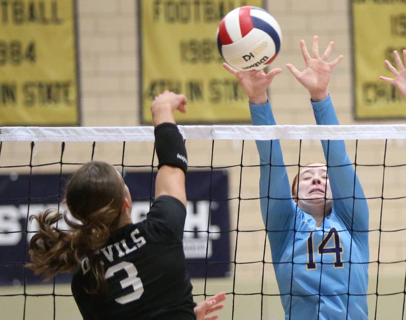 Marquette's Maera Jimenez blocks a spike from Hall's Kennedhy Wozniak on Monday, Sept. 25, 2023 at Bader Gym.