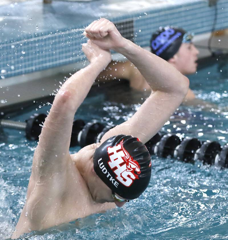 Huntley’s Nathan Ludtke celebrates winning the 50 freestyle during the Fox Valley Conference Invitational swim meet on Saturday,  Feb. 15, 2025, at Woodstock North High School.