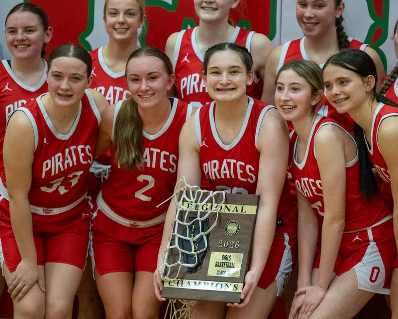 Ottawa Girls Basketball players pose for photo after Regional Championship Win over Sterling on Thursday, Feb. 19, 2026 in Sellett Gymnasium at L-P High School.