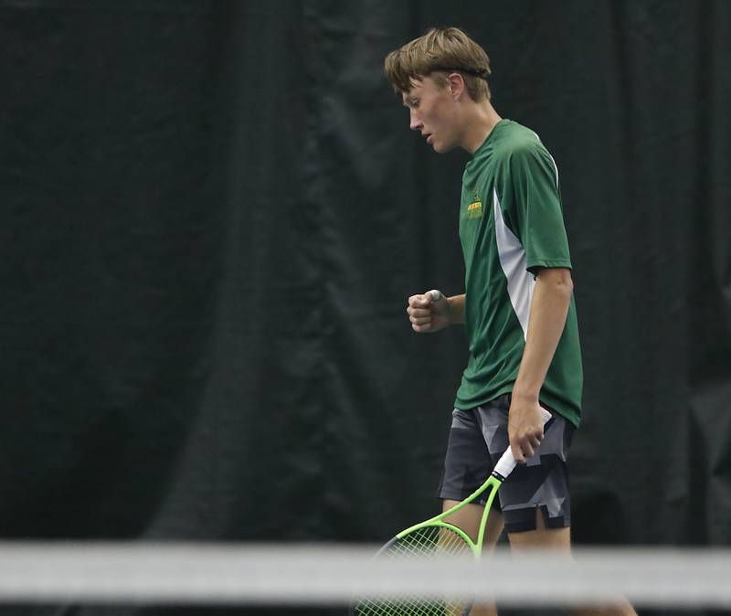 Crystal Lake South’s Jackson Schuetzle reacts to winning a point during his IHSA 1A boys single tennis match against Alton Marguette’s  Stetson Isringhausen Thursday, May 26, 2022, at Heritage Tennis Club in Arlington Heights.