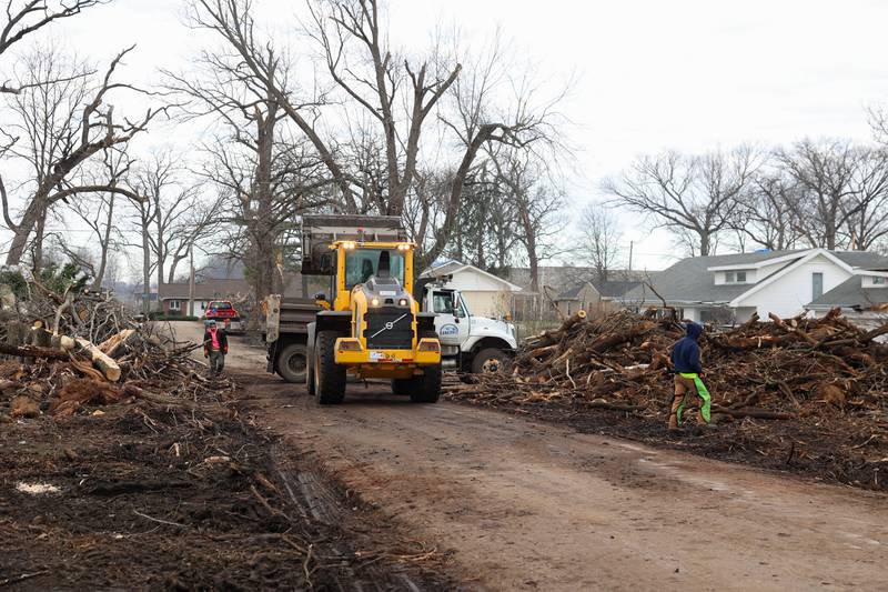 City of Kankakee workers assist with debris removal in the Oakwoods subdivision in Aroma Township on March 19, 2026 following the March 10 tornado.